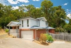6/37 Little Yarra Road Yarra Junction VIC 3797 $680,000 - $720,000 Located in the heart of Yarra Junction, this impressive tri-level home offers a perfect blend of city style living with a wonderful country outlook. Set atop a sloping subdivision, the residence provides uninterrupted mountain views and a serene ambience to unwind in. Hardwood floors grace the living spaces, creating a warm and inviting atmosphere. The family room provides a fabulous retreat, while the open plan kitchen and dining area serve as a central space for family gatherings and entertaining. With three levels, the home offers ample room for both shared connectedness and moments of solitude. The spacious main bedroom is a great size with a walk in robe and a private ensuite. Upstairs, two additional bedrooms feature built in robes and share access to a well appointed bathroom. A versatile nook can be transformed into a study area or a teenager’s media room. Outside, two distinct spaces invite relaxation. The backyard accessible from the dining room and a tiered grassed area ready for your gardening aspirations. The double garage with internal access adds convenience to your daily routine. This property serves as a canvas for your design ideas, allowing you to create a home that is uniquely yours. Conveniently located within walking distance to local primary and secondary schools and the vibrant hub of Yarra Junction, it offers easy access to the Yarra River, Warburton Rail Trail, sporting precinct, and the diverse attractions of the Yarra Valley.