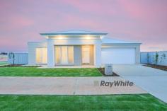 2 Mayne Boulevard Irymple VIC 3498 $695,000 - $764,500 Custom designed and built with the utmost attention to detail comes this brand new build by the award winning Garraway Developments team. Showcasing some of the most desirable and unique features you will find in a home, this residence is one of a kind and could be the home you have long been waiting for. With the highest quality fixtures & fittings, on-trend brushed brass throughout and stone everywhere it could possibly be, there are more and more exciting features the further you look. Designed with a formal walkway, past a large walk in robe, to your luxurious master suite; fluted glass to your en suite shower screen and wood grain mirrors top off this space with large feature tiles. Upon entering a colonial style front door you'll see classic wainscotting throughout the home and this coupled with arched entry points to your formal lounge and walk in pantry set this home apart. As you'd expect, ducted & zoned reverse cycle keep the home under perfect temperature year round, but wait until you walk into your kitchen and living space. Large and ideal for entertaining, the marble look stecca-wood finish to the corner of your island bench will impress all, perfect blending with your caesarstone 'alpine mist' benches and splashback which surround a 900mm induction cooktop, silent range hood and compliment the dual, dark stainless wall ovens & dishwasher. Even the inside of your sink has an all white finish and you can tell that no detail has been missed in this home. The convenience and practicality has not been compromised with a built in TV unit, built in study desk, separate powder area and spacious main bathroom which service three other great sized bedrooms, all catering for the fussiest of buyers with ceiling fans, complete built in robes with mirrors and an abundance of storage. Outside continues to impress with complete pebblecrete paths around the home and axon cladding to the ceiling of your outdoor entertaining area with ceiling fan & TV point. Well designed on the allotment with genuine side access, space for shedding (power & storm water ready to be tapped into) plus further room for a pool should you wish, among fully landscaped gardens with automatic sprinklers. No stone has been unturned in this home, the build has been so well considered and with more features such as high ceilings, raised doorways to every room and more, this one really has to be inspected to be appreciated. And did we mention it's in Irymple? Arguably Sunraysia's most sought after postcode for young families, you will love calling this home.