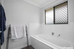 12 Lara Avenue Armidale NSW 2350 $550,000 - $605,000 Introducing 12 Lara Avenue, a contemporary masterpiece situated in a newly developed sub-division. This stunning four bedroom home offers an impeccable blend of modern design and functional living spaces. As you step inside, you’ll be greeted by four spacious bedrooms, each adorned with built-in robes. The master bedroom boasts a generous walk-in robe and a convenient ensuite, providing a private sanctuary for relaxation. The heart of this home lies in its main living area, showcasing an open plan layout that seamlessly connects the tiled living and kitchen spaces. The well-appointed kitchen features a breakfast bar, ideal for casual meals, and a large walk-in pantry that provides ample storage. Stay comfortable year-round with reverse cycle air conditioning, ensuring a pleasant environment for family and guests. For those seeking additional privacy or a cozy retreat, a second option for living awaits in the carpeted media room. Create your own movie nights or simply curl up with a good book for a tranquil escape. Practicality is at the forefront with a double lock-up garage, equipped with an electric roller door and internal access for added convenience. Step outside to discover an undercover patio area, perfect for entertaining and enjoying BBQs with friends and family. The expansive backyard offers an abundance of space for children to play and pets to roam freely. Located in a sought-after neighborhood, this contemporary residence sets the standard for comfortable and modern living. Don’t miss the opportunity to make 12 Lara Avenue your dream home.