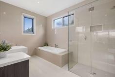 Unit 1/5 Howe St Murrumbeena VIC 3163 $1,400,000 Get ready and get set to fall in love freestanding front residence, offering the supreme flexibility of four bedrooms and dual living with ducted vacumm system, and all the space you need and more within a family-friendly location so close to Murrumbeena Park and junior sports clubs. Its all in store for you and more here, starting with high quality finishes including impressive frontage to Howe Street, rich timber floors, wide hallways and of course, streaming north-western sun that bathes the entire rear living space in natural light. Beyond the hallway, youll love coming home to a gourmet kitchen with stone benches, gloss cabinetry and stainless steel Bosch appliances, where you can entertain in the adjoining dining area, relax in the spacious rear lounge, head outdoors to your private deck and lawns, or even send the kids upstairs to their very own retreat. With the main bedroom downstairs, peace and quiet will be yours, complete with a walk-in robe and fully-tiled ensuite with walk-in shower, while the rest of the bedrooms are upstairs; all a great size with built-in robes and another immaculate bathroom. With a powder room, numerous linen closets, alarm, central heating/cooling, spacious laundry and an extra large garage (with extra OSP in front), this home is a quick stroll to the park, five minutes to Hughesdale station and cafes as well as close to the Murrumbeena shops to create the perfect combination of high quality and low-maintenance.