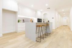 2 Mayne Boulevard Irymple VIC 3498 $695,000 - $764,500 Custom designed and built with the utmost attention to detail comes this brand new build by the award winning Garraway Developments team. Showcasing some of the most desirable and unique features you will find in a home, this residence is one of a kind and could be the home you have long been waiting for. With the highest quality fixtures & fittings, on-trend brushed brass throughout and stone everywhere it could possibly be, there are more and more exciting features the further you look. Designed with a formal walkway, past a large walk in robe, to your luxurious master suite; fluted glass to your en suite shower screen and wood grain mirrors top off this space with large feature tiles. Upon entering a colonial style front door you'll see classic wainscotting throughout the home and this coupled with arched entry points to your formal lounge and walk in pantry set this home apart. As you'd expect, ducted & zoned reverse cycle keep the home under perfect temperature year round, but wait until you walk into your kitchen and living space. Large and ideal for entertaining, the marble look stecca-wood finish to the corner of your island bench will impress all, perfect blending with your caesarstone 'alpine mist' benches and splashback which surround a 900mm induction cooktop, silent range hood and compliment the dual, dark stainless wall ovens & dishwasher. Even the inside of your sink has an all white finish and you can tell that no detail has been missed in this home. The convenience and practicality has not been compromised with a built in TV unit, built in study desk, separate powder area and spacious main bathroom which service three other great sized bedrooms, all catering for the fussiest of buyers with ceiling fans, complete built in robes with mirrors and an abundance of storage. Outside continues to impress with complete pebblecrete paths around the home and axon cladding to the ceiling of your outdoor entertaining area with ceiling fan & TV point. Well designed on the allotment with genuine side access, space for shedding (power & storm water ready to be tapped into) plus further room for a pool should you wish, among fully landscaped gardens with automatic sprinklers. No stone has been unturned in this home, the build has been so well considered and with more features such as high ceilings, raised doorways to every room and more, this one really has to be inspected to be appreciated. And did we mention it's in Irymple? Arguably Sunraysia's most sought after postcode for young families, you will love calling this home.