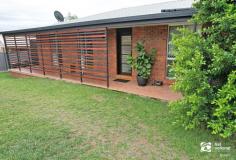 8 Clarke Dr Biloela QLD 4715 $345,000 Welcome to 8 Clarke Dr; a truly loved home in a family friendly location right near the ‘Lions Park’… Do not hesitate! Let’s talk about the interior of the home – it does not disappoint; the large open plan living area is modern and functional; this space features the timeless 2PAC kitchen. The kitchen includes a moveable island bench, dishwasher, plenty of storage and corner pantry. Down the hallway is where you will find the laundry which includes an office nook and access to the back patio. Continuing, are 3 built-in bedrooms featuring new carpet, and the bathroom which has a bathtub, shower, and a separate toilet. One of the many notable attributes of this lovely home is the appealing entertainment deck which captures a refreshing breeze and offers a stunning view towards ‘Tom Dawson Park’ and the hills beyond. This space also has a seamless flow from the kitchen which makes it an incredible spot to accommodate guests. At the rear of the home, you will find the large, powered shed which has clear vehicle access directly from the road through the tall double carport (Bonus = there is plenty of concrete to keep the mowing at a bare minimum). After all of this, additional features include; fencing all around, split-system air-conditioning in the lounge room and all three bedrooms, upgraded ceiling fans, down lights and further fittings.