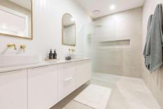 2 Mayne Boulevard Irymple VIC 3498 $695,000 - $764,500 Custom designed and built with the utmost attention to detail comes this brand new build by the award winning Garraway Developments team. Showcasing some of the most desirable and unique features you will find in a home, this residence is one of a kind and could be the home you have long been waiting for. With the highest quality fixtures & fittings, on-trend brushed brass throughout and stone everywhere it could possibly be, there are more and more exciting features the further you look. Designed with a formal walkway, past a large walk in robe, to your luxurious master suite; fluted glass to your en suite shower screen and wood grain mirrors top off this space with large feature tiles. Upon entering a colonial style front door you'll see classic wainscotting throughout the home and this coupled with arched entry points to your formal lounge and walk in pantry set this home apart. As you'd expect, ducted & zoned reverse cycle keep the home under perfect temperature year round, but wait until you walk into your kitchen and living space. Large and ideal for entertaining, the marble look stecca-wood finish to the corner of your island bench will impress all, perfect blending with your caesarstone 'alpine mist' benches and splashback which surround a 900mm induction cooktop, silent range hood and compliment the dual, dark stainless wall ovens & dishwasher. Even the inside of your sink has an all white finish and you can tell that no detail has been missed in this home. The convenience and practicality has not been compromised with a built in TV unit, built in study desk, separate powder area and spacious main bathroom which service three other great sized bedrooms, all catering for the fussiest of buyers with ceiling fans, complete built in robes with mirrors and an abundance of storage. Outside continues to impress with complete pebblecrete paths around the home and axon cladding to the ceiling of your outdoor entertaining area with ceiling fan & TV point. Well designed on the allotment with genuine side access, space for shedding (power & storm water ready to be tapped into) plus further room for a pool should you wish, among fully landscaped gardens with automatic sprinklers. No stone has been unturned in this home, the build has been so well considered and with more features such as high ceilings, raised doorways to every room and more, this one really has to be inspected to be appreciated. And did we mention it's in Irymple? Arguably Sunraysia's most sought after postcode for young families, you will love calling this home.