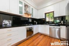34 Formosa St Drummoyne NSW 2047 With a highly flexible layout, spacious interiors, and a prime parkside address, this unique property will appeal to growing families looking for their forever home. Beautifully maintained by the same owner for over a decade, the home blends period detail with a modern aesthetic to deliver a charming and comfortable living space. Set within 100m of Brett Park and the iconic Bay Run, the property capitalises on its excellent lifestyle location by delivering leafy park views and sparkling water glimpses from each of its three levels. Offering exceptional versatility, the floorplan can be configured to include four bedrooms, or three bedrooms plus additional lounge or office. Conveniently located for local retail and CBD transport with Birkenhead Point and express bus routes both within 250. • Three-level, parkside family home with a versatile layout and plenty of space • Two large first floor bedrooms, one with park views, one with modern ensuite • Open plan living and dining space with soaring ceilings and delightful park outlook • Sleek and modern gas kitchen featuring Smeg appliances, and ample storage • Additional guest bathroom including marble tiling and combined bath and shower • Huge laundry, plus storage. Tiled sunroom with sliding doors to outdoor area • Private and secure wraparound courtyard with established greenery • Top level master bedroom includes 'rooftop' balcony and district views • Double auto lock-up garage. Extensive storage space in roof eaves and under house