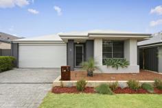 26 Citrine St Banjup WA 6164 $700,000 Welcome to your new modern family haven in Treeby! This superb 4-bedroom, 2-bathroom family home is ideally located on an easy-care block and within walking distance of Treeby Primary, the shopping centre, daycare facilities, and local parks. Step inside to experience a beautifully sunlit open-plan living space, creating a warm and inviting atmosphere for family gatherings in the spacious meals and family zone. The kitchen is a chef's delight, boasting stone benches, a tiled splash-back, island breakfast bench and quality fixtures and appliances. Whether you're entertaining or preparing a family meal, this kitchen is as stylish as it is functional. For those moments of relaxation, retreat to the separate games or media room - a perfect sanctuary to enjoy a movie or unwind in peace. The main bedroom is a bright oasis with a walk-in robe and generous ensuite featuring stone benchtop, Italian porcelain tiles, shower, and toilet. The remaining three bedrooms are all generous in size and feature built-in robes, providing ample storage space. The second bathroom is equally impressive, offering a stone benchtop, Italian tiles, shower, and a separate bath for the kids. Outdoor entertaining is a breeze with a lovely alfresco area, perfect for hosting friends and family. Practicality meets convenience with a double remote garage featuring shoppers' entry, ducted air-conditioning throughout, freshly painted and a gas outlet for heating. The easy-care reticulated & recently landscaped grass & gardens ensure your outdoor spaces always look their best, and the laundry is equipped with a stone benchtop and ample storage. Enjoy the perfect blend of suburban tranquillity and urban convenience. Treeby offers a beautiful lifestyle, and a short drive will take you to Cockburn Central shopping centre and train station, providing easy access to the city.