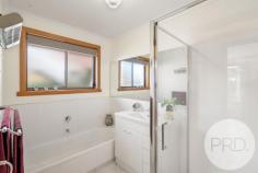 11 Kilander Crescent Berriedale TAS 7011 $649,000 + 3 Bedrooms - 2 with built-ins, main with stylish ensuite + Spacious lounge & dining area + Large modern kitchen & storage + Waters views + New outdoor entertaining area and landscaped gardens + Plenty of storage under + Double garage and workshop
