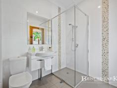 50 Elouera Cres Moorebank NSW 2170 $1,659,000 Situated in a prime location with easy access to the walkway leading to the Georges Cove upcoming marina, this large family home offers an abundance of space and luxury living on a generous 682 sqm block. Discover the features that make this property a must-see: Spacious Living: This house boasts extra-large rooms, providing your family with ample room to live, work, and play. Rumpus Room with Fireplace and Bar: The huge rumpus room is a perfect space for relaxation and entertainment, complete with a fireplace and built in bar. It opens to a view of the large inground pool, making it an ideal spot for gatherings and parties. Separate Living Areas: Enjoy the freedom of separate lounge, dining, family and rumpus areas, providing versatility and space for all your family's needs. Four Bedrooms: Upstairs, you'll find four bedrooms, with the main bedroom featuring an ensuite and walk-in robes. New carpet and paint throughout the bedrooms ensure a fresh and welcoming atmosphere. Double Garage: The two-car garage is generously sized and even has room for a boat, making it ideal for those with a passion for water-based adventures. Inground Pool: The large inground pool is the centerpiece of the outdoor area, perfect for cooling off in the summer months and creating memorable moments with family and friends. Carport: The expansive carport is perfect for hosting parties, providing shelter for vehicles, or even serving as a versatile workspace. This Moorebank gem offers an exceptional opportunity for family living, combining space, comfort, and unbeatable convenience. Don't miss your chance to make this property your own.