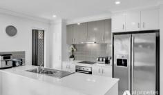 51 Orb St Yarrabilba QLD 4207 $589,000 Step into a culinary haven with the kitchen’s inviting Caesar stone benchtop, perfect for culinary creations and hosting gatherings. Abundant storage cabinets add a touch of practicality to this culinary space. The air-conditioned living and dining areas exude spaciousness, providing a year-round comfortable retreat. These areas seamlessly connect to a covered alfresco space, creating an ideal setting for endless entertainment possibilities. Ensuring a retreat within the home, the media room is strategically positioned at the front, granting privacy and tranquillity from the main living zones. This dedicated space is further enhanced by its own air conditioning, promising a consistently enjoyable experience throughout every season. The master bedroom stands as a sanctuary, featuring a walk-in robe, ensuite, and air conditioning. Meanwhile, the additional bedrooms offer both built-in robes and light ceiling fans, ensuring comfort and convenience. The well-designed main bathroom serves as a central hub, catering conveniently to the main living spaces and remaining bedrooms. A separate toilet and nearby laundry contribute to the functionality of this thoughtfully planned living space. As you step outside, the undercover area presents a delightful view of a low-maintenance, fully fenced yard. This arrangement ensures both privacy and security, making it a perfect extension of the indoor living space. Adding to the allure is a double remote-control garage, serving not only as a secure parking space but also providing extra storage capacity. All windows and doors are equipped with security screens, providing an added layer of safety and peace of mind. This meticulously designed and well-appointed residence seamlessly combines practicality with comfort, offering a harmonious and inviting place to call home. Property Features: • Constructed in 2016 • Kitchen boasts a Caesar stone benchtop and ample cabinet storage • Tiled living and dining area with air conditioning • Air-conditioned media room for entertainment • Master bedroom includes ensuite, walk-in robe, and air conditioning • Main bathroom features a shower, bathtub, and separate toilet • Laundry inside with external access • Security screens on all windows and doors • Covered alfresco area for outdoor enjoyment • Double remote-control garage • Fully fenced yard for added privacy and security