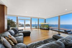14 Lady Wakehurst Drive Otford NSW 2508 This stunning home defines luxury, from the private gated entry and huge block size to the panoramic ocean vistas from almost every room in the house. If you are looking for something truly special, then you can't go past 14 Lady Wakehurst Drive, Otford. THE HOME * One of only a handful of true prestige properties along the Northern Illawarra coastline. * The elevated position provides you with ample privacy as well as breathtaking 200o views extending along the coastline and out over the ocean. Photos cannot do justice to the breathtaking outlook from this stunning property, every day offers something new and just as amazing as the day before. Watch the sun rising over the horizon, whales frolicking and and pods of dolphins playing. * A 25 metre infinity pool and spa have been built into the deck and offer a real 'WOW' factor. This engineering feat is not just visually impressive, it is the perfect space to enjoy time with family and friends during those warm summer days. * This master suite is unparalleled. Encompassing the entire top floor of the home, it features an immense main bedroom, a walk-in robe that is equally as big as the main bedroom, a beautiful ensuite and of course panoramic ocean views. Wake up to views of the sun rising over the ocean from the comfort of your bed. * The generous 9,719m2 is perched high on the hilltop, surrounded by trees and overlooks the ocean and valley below. It features ample yard space along with a storage shed and stable. * While upstairs presents an open plan living/dining layout with several spacious bedrooms, downstairs offers ultimate versatility for a parent's retreat or separate guest accommodation based on your needs. * Gourmet kitchen is a chef's dream. Spacious design, large walk-in pantry, island bench with breakfast bar and as always… views. * For those with plenty of cars and other toys, the 250m+ garage with concrete flooring is the perfect space to showcase these. It is as much of a gallery as it is a garage. WHAT ABOUT THE LOCATION? * Only a short drive to the beach, rockpool, public transport and the famous Seacliff Bridge. Embrace that relaxed coastal lifestyle with swimming, fishing, surfing, hiking and sunrise/sunset walks on the beach all available only moments from your doorstep. * Walking distance to the entry for the Royal National Park along with all of its pristine beaches and hiking trails. Enjoy a piece of untouched paradise right at your doorstep. * This is one of the most desirable suburbs on this pristine coastline. It is the perfect coastal retreat approximately 1 hour South of Sydney CBD and approximately 30 minutes North of Wollongong CBD. * Otford offers a community-based coastal lifestyle with an easy access to Sydney and Wollongong and all that the Northern Illawarra has to offer.