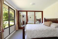 7 Forest Park Road Blackheath NSW 2785 $980,000 - $1,075,000 Set on a generous level block, this immaculately presented family home offers multiple living areas and ample storage throughout. With four light-filled well proportioned bedrooms, a fabulous covered entertaining area and a low maintenance garden, this an ideal opportunity for those looking for a peaceful setting within a 3km drive of Blackheath Village and the local primary school. Features Breakdown: Tandem carport to fore and huge workshop to rear with space for vehicle Dual living areas offering versatile use for family members Smooth indoor/outdoor transition to superb covered entertaining area 4 well proportioned bedrooms with built-in robes in all; master ensuite Open plan kitchen with gas cooktop; separately zoned dining area Huge workshed with additional storage, power & plumbing options Ducted gas central heating throughout; immaculate floating wood floors Level lawned garden with gated driveway, perfect for pets & children 8.2 kilowatt solar panels; 1,160sqm level block Peaceful position close to iconic walking tracks & access to public bus Relaxed and inviting, this quarter acre property offers the opportunity to secure contemporary, low-maintenance living in a sought-after secluded pocket of Blackheath.