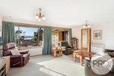 11 Kilander Crescent Berriedale TAS 7011 $649,000 + 3 Bedrooms - 2 with built-ins, main with stylish ensuite + Spacious lounge & dining area + Large modern kitchen & storage + Waters views + New outdoor entertaining area and landscaped gardens + Plenty of storage under + Double garage and workshop