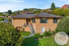 11 Kilander Crescent Berriedale TAS 7011 $649,000 + 3 Bedrooms - 2 with built-ins, main with stylish ensuite + Spacious lounge & dining area + Large modern kitchen & storage + Waters views + New outdoor entertaining area and landscaped gardens + Plenty of storage under + Double garage and workshop