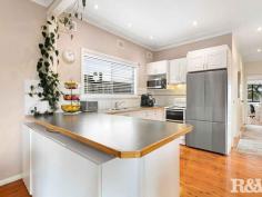 42 Terry Ave Woy Woy NSW 2256 $930,000 - $970,000 Only a short 1km walk to Woy Woy train station & Deepwater Plaza is this charming 3 bedroom home on a level 467.9 sqm block with drive through side access, an air-conditioned office space and off street parking for up to 3 cars. This tidy home presents very well and has a great floor plan, all 3 bedrooms are good in size, the main with built-in robes, there is a large living room with air-conditioning, an open plan kitchen and dining area and a large covered entertaining deck. Other features of this surprising home include - - en-suite to the master bedroom - single carport - workshop - air-conditioning - polished timber floors - backs onto the Peninsula Leisure Centre and sporting ovals Located in a quiet street, close to transport, this property is definitely worth an inspection.
