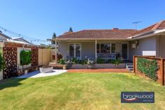 42 Turon St Morley WA 6062 $539,000 Like a beautiful beacon calling you home, this sensitively renovated 1960s home glows with its fresh, neutral colour scheme, polished jarrah floors with a mirror-like finish and sensitive updates/modernisations. A private front courtyard offers an impeccable outdoor entertaining space, the central open plan is a relaxed space to gather with friends and family and the modern kitchen is a practical and on-trend area to prepare easy mid-week meals and memorable celebratory feasts. 3 bedrooms 1 bathrooms Renovated 1960s charmer OP living and entertaining Fabulous modern kitchen Chic bathroom and laundry Landscaped front courtyard Firepit & integrated seating Double carport solar panels 312 sqm no-fee strata lot The glitter of a polished gem It is not an exaggeration to say this home sparkles with the effects of a top-to-toe renovation. Jarrah floors extend across the plan, providing a cohesive element and underpinning a commitment to retaining original integrity while introducing new, modern materials. A central open-plan living space is bathed in natural light thanks to a picture window on the enclosed front garden, lawn and an outdoor entertaining zone. At one corner of the central living zone is a chic, modern kitchen with a small timber-topped island, crisp white overhead and under bench cabinetry, an electric oven, gas hob and dishwasher. Warm grey tiles with sharp white grout fashion a striking splashback and tie together the stainless-steel appliances and cabinetry. In the family room, an electric fire with a stone surround offers a focal point and the promise of wonderfully cosy nights during the cooler months. French doors connect the dining area to the outdoor living space, where a firepit, built-in seating and decking are sheltered within high courtyard walls. A door from the living zone leads to the bedroom wing, an arrangement of three generously proportioned rooms, all with built-in robes. The main bedroom boasts a white beadboard wall, a wall of fitted robes and a large picture window. Both junior rooms are finished to an exceptionally high standard. The family bathroom and laundry are an exercise in style and function with a limited palette of colours and materials producing modern, minimalist and inviting spaces. The strong sense of stylish functionality continues in the laundry with its built-in storage and worktop. Don’t miss the opportunity to inspect this beautifully presented, stylishly renovated Morley home. Neighbourhood parks and reserves, Galleria Shopping Centre, and a choice of local schools give this property an abundance of appeal for young families, downsizers, and first-time home buyers.