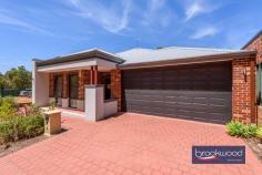 Unit 15/1425 Jacoby St Mundaring WA 6073 $625,000 Occupying a prime position in a prestigious over-55s development, this impeccably presented, freestanding Impressions home is surrounded by established gardens and boasts an accessible design. Spacious, light-filled interiors, a modern kitchen, and an outdoor entertaining zone with automatic screens make this beautifully finished property, surrounded by communal open spaces, an excellent choice for those over 55s looking to embark on a new adventure in the Perth Hills. 3 bedrooms 2 bathrooms 2017-built Impressions home Brick and Colorbond Spacious accessible design OP kitchen/meals/family Fantastic modern kitchen Alfresco entertaining UMR Garage storage & shoppers’ Prestigious over-55s complex 382 sqm landscaped corner Surrounded by a community garden and native bushland, Hilltop Grove Estate offers refined living within a boutique community. This 3-bedroom, 2-bathroom home is welcoming, modern and easy-care. An expansive open-plan living zone with a stunning timber kitchen, dual aspect glazing and seamless movement to the east-facing alfresco entertaining area is central to the uncompromising standards of this impressive property. The kitchen boasts ample storage and bench space, an island bench with a stone top and integrated breakfast bar, an electric wall oven, an electric cooktop, and a dishwasher. Subtle, modern colours leave scope for you to personalise. The shelter and calm of the alfresco entertaining area with views of the lush lawn and gardens hold the promise of time spent contemplating the peace and beauty of your surroundings. The understated luxury of the large principal bedroom, with reverse cycle air-conditioning, a walk-in wardrobe and an ensuite with a walk-in shower, will make the mornings that you choose to linger in bed a pleasure. Two junior bedrooms – with built-in robes and ceiling fans – are situated at the rear of the plan, along with the spacious family bathroom and a separate W.C. This arrangement creates a sense of privacy for you and your guests. A walk-through laundry with ample storage is centrally located yet discreetly separate. A double garage with space for storage and remote entry has direct access to the home, ensuring that loading and unloading – shopping, suitcases, grandchildren – is a breeze. Hilltop Grove represents a standard of living that doesn’t require compromising on convenience, access to amenities, activities or the wider world. The bustle of Mundaring Village is within easy reach, so are walking trails and sporting facilities, while Mundaring Weir or the Swan Valley make for a leisurely day trip. If travel further afield is on your agenda, Perth airport is less than a 30-minute drive, and the peace of mind that comes with being able to lock up and leave, knowing your neighbours will keep an eye on things, is another advantage of life in this exclusive community. As a resident of Hilltop Grove, you will also have access to the large and comfortable Community Centre. Set in the heart of the complex, it is a wonderful, shared space with a kitchen, dining room and entertaining space, making it ideal for hosting extra special celebrations with friends and family. This community hub also includes a TV room and gym equipment for you to use at your leisure. At the rear of the complex, there is additional space to park your caravan when you’re not off exploring the country. Conveniently close to Great Eastern Highway, a short drive from Mundaring Village, and 15 minutes from the Midland CBD. If you are ready to downsize on your terms, the exclusive Hilltop Grove Estate offers a stylish base for life in the Hills.