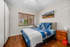 87 Azalea Avenue Coffs Harbour NSW 2450 $699,000 - $749,000 Unveil the ideal fusion of contemporary living and natural beauty at 87 Azalea Avenue, Coffs Harbour. As you step into this pristine residence, you'll be captivated by its charm, featuring not only three bedrooms, two bathrooms, and two parking spaces but also an air of sophistication that defines modern elegance. Revel in the refinement of a meticulously upgraded kitchen and bathrooms, where every detail has been carefully considered to elevate your living experience. But the allure doesn't stop there - this home beckons you to indulge in outdoor bliss. Picture yourself effortlessly entertaining in the expansive outdoor areas, surrounded by the tranquility of nature and breathtaking panoramic escarpment views. The sanctuary of your home becomes a haven, inviting you to unwind and appreciate the serenity that this property exudes. Situated on a generous block, this residence not only offers ample space but also a seamless blend of functionality. The property boasts a large tandem garage, complete with a workshop and convenient under house storage, providing the perfect solution for your storage needs. Strategically positioned in close proximity to town, this property strikes a harmonious balance between the tranquility of suburban living and the convenience of urban amenities. Don't let this opportunity slip away - seize the chance to make this stunning property your new home, where every corner reflects a timeless blend of style and comfort. • New Dishwasher/Oven • Ceiling Fans • Air Conditioning • Work Shop • Fire Place • Original Hard Wood Floors