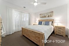 12 Crowhurst St Golden Grove SA 5125 Secure and sound, boasting beautiful street presence within the tightly held, Spring Hill Estate will excite the senses upon arrival to your beautifully presented new home. An entertainers delight, this opportunity offers vibrant family living across a flexible and recently renovated design. Refreshingly move in ready, this gorgeous home presents three generously sized bedrooms paired with two separate living areas and two bathrooms that seamlessly blend across recently laid floorboards and new carpets that fit in with the homes modern day aesthetic. The current owners have worked hard in renovating this beautifully maintained home to a level of what feels like brand new. Boasting top tier fixtures and fittings for the lucky new owners to enjoy for many years to come. Families will appreciate spacious surrounds matched with varied living zones to keep everyone happy across the busy weeks, whilst the avid entertainer will adore the new kitchen that has been meticulously fitted out with white gloss cabinetry, Bosch and Miele appliances along with a handy breakfast bar to utlise on those busy, on the go mornings. Discover an abundance of storage options that integrate into this cleverly designed fit out with space for a double door fridge and freezer. The exceptional find exudes a contemporary lifestyle with the added bonus of a double car garage plus a third carport that can easily accommodate your prized caravan, boat or third car if desired. The master bedroom fills with natural light of an afternoon via the widely set bay window, creating a perfect spot to relax and recharge within. Enjoy the use of an ensuite and sizeable walk-in-robe with plenty of room to accommodate that shoe collection within. Bedroom two is fitted out with a generous BIR and you will find ceiling fans in each bedroom for extra creature comfort. The exquisite main bathroom has been freshly renovated and features luxe fixtures and fittings along with a separate powder room, bath and shower area to enjoy. Enjoy all year round comfort with gas ducted heating and evaporative cooling along with a near new, 6.6 k/w solar system that has been installed to eliminate surging power bills. We know you will love entertaining excited visiting family and friends within your near new, salt chlorinated swimming pool across those hot weather days complete with benched seated and stylish and secure pool glass fencing. The low maintenance alfresco space offers you peace and privacy within a fully fenced rear yard with easy care gardens. Nestled in the heart of the enviable Spring Hill Estate, this Fairmont Home build presents an opportunity that you don’t want to miss. Its prime location offers the perfect blend of convenience and tranquility, close to both public and private school selections and local shopping centres making it an ideal acquisition for those seeking a secure lifestyle of comfort and ease.