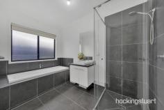 8 Wandana Wy Mernda VIC 3754 Stylishly presented within a premier pocket, this surprisingly spacious contemporary home is thoughtfully laid out and superbly appointed, easily answering the demands of a modern family lifestyle in desirable, low-maintenance luxury surroundings. A retreat-sized main bedroom with a walk in robe ensuite is complemented by two further bedrooms sharing an equally impressive family bathroom, while expansive living area partner with a spacious entertainment area to create enough space for the largest family event. Enviably located moments from parklands and playgrounds, it's an easy walk into all the lifestyle delights on offer in the heart of Mernda Village, and the station is just minutes away. Three bedrooms | retreat size main bedroom | basins | shower | walk-in robe | stone finished kitchen | 900 mm cooker | expansive entertainment area | ducted heating and cooling | family size fitted laundry | remote double garage with internal access | fuss free Colourbond fencing | decked back yard | solar power | easy care gardens | THINGS WE THINK YOU'LL LOVE: - The retreat-sized main bedroom has a walk in robe an ensuite. - The expansive decked entertainment area and living space will easily cope with any family event - Solar panels help with the power bills - Being so close to the Village means never having to worry about forgetting a dinner ingredient -There are parks all around for the kids and pets to blow off steam