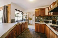 190 Bland Rd York WA 6302 Space, views & potential abounds Situated on a spacious 5-acre parcel in the heart of York, 190 Bland Road invites you to experience the charm of a bygone era. This property holds plenty of character and is an affordable retreat with a rustic appeal. The home has scenic views of the iconic Mt Bakewell where you can sometimes see para-gliders taking off and hot air balloons floating past. The property has two bedrooms, with their own split system air conditioning as well as floor to ceiling mirrored wardrobes. There is a well sized study at the front of the home that could be used as another bedroom. The kitchen, is aglow with natural light, there is a beautiful copper rangehood and the cupboard doors are made of solid timber. The kitchen serves as a cozy space for family gatherings. Features: – 2 bedroom, 1 bathroom plus study – 5 acre property close to town – Open plan kitchen and dining area – Large separate lounge room with wood fire – Generous laundry – Split system air conditioning – Slate flooring throughout – Large bathroom with original retro tiles – Two Horse paddocks with the potential of a third – Poultry pens & a geese enclosure – 4500 litres rain water tank – 6 x 7m powered work shop – Electric fences to the boundary – Starlink satellite installed – Instant gas hot water system