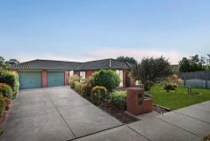 5 Noel Road Langwarrin VIC 3910 $650,000 - $699,000 Revelling in lifestyle ease so close to parks, playgrounds, shops, recreational facilities and Langwarrin Park Primary School, all just a short walk away, this sundrenched single-storey home unites space, comfort and affordability in a wonderfully family-focused enclave. With a north-facing aspect maximising the natural light, the residence boasts two interconnecting living zones with plush waffle carpeting supplying comfortable dimensions for couples and families alike. A sleek kitchen with breakfast peninsula, stainless-steel oven and a glass ceramic cooktop is well-placed in the heart, while glass doors flanking the family room glide open to covered verandah and easy-care fully fenced garden, which provides an idyllic setting for outdoor hosting and weekend unwinding. Residents will enjoy the comfort and convenience in the master bedroom with a walk-in robe and ensuite-style access directly to the bathroom, while a separate WC, two additional bedrooms, ceiling fans and a double garage are among the inclusions. Secure within the coveted Elisabeth Murdoch College zone and just 400 metres to the primary school and around 10-minutes' walk to both Langwarrin Plaza and the major shopping of The Gateway, the property is just a few minutes' zip to the freeway onramp for an easy commute into Melbourne.