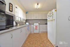 46 State Farm Rd Biloela QLD 4715 $265,000 Conveniently located in a good residential area, close to the Biloela Bowls Club and sporting fields, 46 State Farm Road really is a great choice for investors or first home buyers looking to enter the property market. This well-maintained home features an L shaped walk-through kitchen with a large pantry. Two of the three bedrooms have built in cupboards. In the spacious lounge is a lovely wood fire heater along with a split system air-conditioner plus updated ceiling fans throughout the home. The bathroom has a shower and there is a separate toilet. Additional features include smoke alarms, security screens on all windows and doors and a large laundry at the back of the home plus a ramp leading to the backyard. The yard is fully fenced with vehicle access straight through the carport. Included in the sale of this home are 2 rugs, 2 fridges, TV cabinet, Coffee table and bed. This home is classic in design and built to stand the test of time, do not miss out on this unique opportunity.