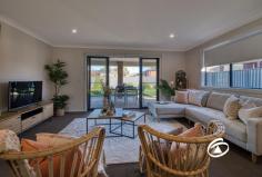 25 Tangelo Terrace Pakenham VIC 3810 $580,000 - $638,000 Experience ease and comfort at its finest with 25 Tangelo Terrace! Whether you're seeking a family abode, a savvy investment, or downsizing, this property is the perfect fit. Nestled in a coveted location on the North side of the highway, it offers convenient access to all amenities, including Pakenham Marketplace, Lakeside Shopping Precinct, eateries, schools, and public transport. Inside, discover three generously sized bedrooms, with the master boasting a walk-in robe and ensuite, while the remaining bedrooms feature built-in robes and share a family bathroom. The sleek and contemporary kitchen is the heart of the home, equipped with stainless steel appliances, seamlessly flowing into the open-plan dining and family living area. Step outside to enjoy the privacy of the alfresco space and the secure, low-maintenance backyard. Additional perks include a double lock-up garage with internal access, split-system heating/cooling, dishwasher, downlights throughout, and more! This home will not be around for long, so don’t miss out on the opportunity to make it yours!