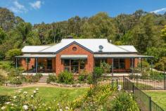 9 Greens Lane Myrtleford VIC 3737 $1,370,000 Nestled in the undulating hills of the Buffalo valley, this enchanting 4-bedroom, 2-bathroom retreat offers a unique blend of rustic charm and modern comfort, inviting you to immerse yourself in a serene country lifestyle. Spread across a generous 6.408 acres of meticulously manicured land, this captivating abode exudes warmth and tranquility at every turn. As you step inside, you are greeted by a seamless fusion of rustic elements and contemporary design. Cedar windows and doors frame the exterior, perfectly complementing the natural beauty of the surrounding landscape. The heart of the home is the open-plan kitchen, dining, and living area - the use of natural elements and light create an inviting and familiar ambience all homes seek. The master bedroom is secluded from all others room offering priceless privacy and boasts an ensuite and walk-in robe for ultimate convenience. Bedrooms two and three feature built-in robes for added ease and the main bathroom showcases a luxurious corner spa bath and walk-in shower. The fourth bedroom positioned off the laundry is a whimsical retreat featuring a walk-in robe adorned with a rustic barn door and a split system for year-round comfort. A quaint study nook also located in this private entrance to the home offers a dedicated space for work or relaxation. Year-round comfort is guaranteed with new ducted evaporative cooling and zoned floor heating, allowing you to enjoy the changing seasons in style. Venture outside to a haven of outdoor bliss, where a sparkling salt-chlorinated in-ground pool awaits, complete with a character-filled bar area and new pool equipment. Intimate seating areas scattered throughout the property provide perfect spots to unwind amidst the picturesque surroundings. The outdoor oasis continues with an undercover BBQ area featuring a charming chiminea, ideal for alfresco gatherings with loved ones. A spacious workshop/shed with a double carport offers ample space for vehicles, tools, and hobbies, embodying the essence of country living. Meticulously maintained gardens bloom in vibrant hues, creating a kaleidoscope of colors and scents, while a fire pit sitting area and tranquil ponds beckon moments of peaceful contemplation. Practicality meets luxury with 16 taps drawing water from a 60m bore, ensuring a constant water supply, and 24 solar panels generating 4.7Kw, minimizing your environmental impact. This property is a testament to the perfect marriage of rustic elegance and rural tranquility, offering a sanctuary where charm meets functionality. Embrace the serene beauty of this acreage retreat and turn your dream of a country escape into a reality. Additional features include: Two shipping containers for ample storage Vegetable garden Childrens playground Garden shed Chicken enclosure