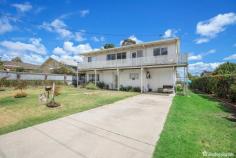 11 Church Avenue Uralla NSW 2358 $440,000 - $480,000 Nestled in the heart of the serene town of Uralla, 11 Church Avenue unveils a distinctive two-storey residence, graciously occupying a generous 910-square-meter parcel. Situated on a peaceful street, this home enjoys proximity to educational facilities with Uralla Central School just a block away, while the vibrant main street beckons a mere two blocks distant. Upon entering the residence, the lower level unfolds with a modern kitchen that seamlessly combines functionality and style, boasting ample space for a double fridge and equipped with a convenient dishwasher. The warmth of a wood heating system enhances the ambiance, creating a cozy atmosphere throughout. This level further accommodates a versatile living room, which can easily transform into a guest bedroom as needed, a home office space and an integrated laundry/bathroom completes the practicality of the ground floor. Ascending to the second level, discover a well-designed layout hosting four bedrooms, three of which feature built-in robes, offering both comfort and storage solutions. The central bathroom ensures convenience for the upper level residents. A second expansive living area on this floor provides a private retreat for relaxation and leisure. This residence embraces year-round comfort with reverse cycle air conditioning units strategically placed on both levels. Stepping outside, an inviting 16m x 3m lap pool awaits, presenting an ideal oasis for recreation and fitness. The outdoor entertaining area beckons for gatherings, complemented by the presence of two garden sheds catering to storage needs. 11 Church Avenue stands as a testament to modern living, blending practicality with sophistication in an enviable location. With its thoughtful design, abundance of living space, and enticing outdoor features, this property invites you to experience the epitome of relaxed and stylish living in the heart of Uralla.