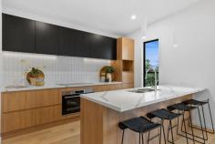 3 Dusk Street Kenmore QLD 4069 Contemporary, luxurious and superbly designed, this brand new home features stunning interiors with premium appointments, across two spacious levels. It's a stylish haven complete with private leisure facilities, for those who love to live comfortably and entertain in style. The thoughtfully planned layout also allows scope for dual living, to suit multi- generational families or to provide teenagers with their own space. Spanning an elevated easy-care block in a peaceful locale, you're within minutes of Kersley Road Shopping Village, Kenmore South State School and bus services to the city. Foyer with soaring ceiling, designer lighting, striking staircase Radiant open plan lounge/dining room with on-trend colour scheme and high ceilings throughout Flows onto northerly facing entertaining deck with district views Living area with drinks bar extends onto poolside patio and garden Kitchen has quality cabinetry, butlers' pantry and Argent tapware Bosch 900mm self-cleaning oven, induction cooktop with PerfectFry Generous bedrooms, versatile study to use as nursery or guestroom Main bedroom includes robes, ensuite with dual basins, Juliette balcony Sleek bathroom with freestanding bath, two separate powder rooms Custom timber cabinetry, stone finishes in kitchen and wet areas Ducted air conditioning, fans, beautiful breezes and natural light Double garage, professionally landscaped low maintenance grounds Walk to parks, few kilometres to cafés and supermarkets at Kenmore Set in the highly sought-after Kenmore State High School catchment Central to the Centenary Highway, Western Freeway, Legacy Way