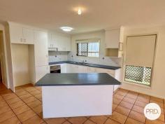 25 Cremorne Drive Tannum Sands QLD 4680 $479,000 Welcome to 25 Cremorne Drive, Tannum Sands! This stunning 3 bedroom, 2 bathroom house is the perfect family home. With a spacious backyard, beautiful landscaping on a 682m2 block and a double garage, this property has everything you need. • The house features a serviceable kitchen with plenty of bench and cupboard space, with electric oven and stove top appliances • Open plan tiled kitchen, dining and lounge room with ceiling fans, air conditioning and access to the outside patio • Dark tinted windows, security screens and pull down blinds throughout • The master bedroom is generously sized with air conditioning, offering a walk in robe and ensuite • Bedroom two has a built in robe, carpet flooring, air conditioning and ceiling fan • Bedroom three has a built in robe, carpet flooring and ceiling fan • Main bathroom with bath, shower, vanity and separate toilet • Under covered entertainment area, which provides a tranquil space for outdoor activities and relaxation • Fully fenced backyard with timber and colorbond and side access • Garden shed, hills hoist clothes line and lovely lush grassed areas throughout providing a peaceful oasis, perfect for enjoying the outdoors • Double lock up remote garage