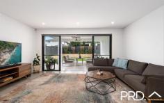 51 Wall Avenue Panania NSW 2213 $1,339,000 Appointed for a contemporary lifestyle, this executive residence has been intuitively designed with the finest of finishes with a growing family in mind. With easy access to local amenities, this beautiful duplex does not disappoint - Spacious living and dining with pet-friendly door leading out to the backyard - Quality kitchen includes gas cooking & large island stone bench with waterfall ends - 4 bright sunny double bedrooms + built-in robes - Large master bedroom + walk-in robe, ensuite and private balcony - Large skylight window upstairs, allowing a wealth of natural light - Ducted air-conditioning throughout & integrated 6.6kw solar panel system - Generous outdoor alfresco, perfect for weekend BBQ's with friends & family - Lock up garage with internal access - Sunny, secure backyard with room for the kids to run & play - Lovely wide street with minutes walk to Panania train station to city & airport - Close to local schools, parks, shops & transport Perfect location and great block of land, this generous size family home offers a cracking opportunity