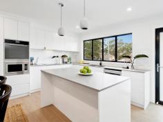 32B Hume Drive Helensburgh NSW 2508 Indulge in the ultimate low-maintenance lifestyle within this exquisite Torrens Title duplex! Bathed in natural light, this residence boasts four bedrooms, an open-plan living area, and high-quality finishes throughout, ensuring a seamless move-in experience. HOME: • Ideal for first-time homeowners, downsizers, or investors, this versatile home caters to various lifestyles. • TORRENS TITLE means there are no strata fees or levies. • The home is in an elevated position with views extending out over the nearby bushlands. • Four bedrooms, each equipped with built-in wardrobes, while the master bedroom boasts its own ensuite, walk-in wardrobe, and a private balcony. • Revel in the open-plan living, dining, and kitchen space that flows freely out to the outdoor entertaining area and full fenced backyard, a haven for avid hosts. • Reverse cycle air conditioning ensures you stay cool during summer and warm in winter. • Lock-up garage with internal access. • Benefit from two separate living areas. This ensures everyone has their own space. • This is low maintenance living at its best. Spend your free time enjoying the amazing lifestyle that Helensburgh and the nearby coast offer, instead of worrying about excessive property upkeep. LOCATION: • Situated in a convenient central spot in the heart of Helensburgh, close to all essential amenities. Within a few minutes' walk, discover local cafes, schools, shops, and restaurants. • Just a few minutes' drive from your front door, Helensburgh train station offers easy access, while nearby bus stops are just a short walk away, perfect for those who rely on public transport. • Surround yourself with nature, as the Royal National Park and Stanwell Park Beach are in close proximity. • Helenburgh is approximately 1 hour south of Sydney CBD and roughly 30 minutes north of Wollongong CBD. • Embrace the quintessential coastal lifestyle and its offerings, including swimming, fishing, bushwalking, hang gliding, and family picnics in popular parklands, all just moments from your doorstep.