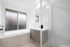8 Harden Street Armidale NSW 2350 $550,000 - $600,000 Welcome to 8 Harden Street, an exquisite newly built modern home located in the desirable North Hill area of Armidale. This thoughtfully designed residence boasts three generously sized bedrooms, each equipped with built-in wardrobes. The master bedroom offers a touch of luxury with a walk-through robe leading to a private ensuite. The main bathroom is a haven of relaxation, featuring a deep bath, a shower, a contemporary floating vanity, and a separate toilet. The seamless flow of the open-plan living and dining room is enhanced by reverse cycle air conditioning, ensuring comfort in all seasons. The kitchen is a culinary delight, with ample storage space and a stylish island bench complete with a breakfast bar. The living area effortlessly extends to the undercover patio, creating a perfect space for entertaining or simply enjoying the outdoors. For your convenience, this property includes a double lock-up garage with internal access, providing secure parking and easy entry into the home & 6.6kw Solar System. The fully fenced backyard is a blank canvas, offering plenty of space for your gardening aspirations, whether it be planting trees or creating beautiful garden beds. Situated on a 502 square meter block, this property combines modern elegance with functional design, making it an ideal family home. Don’t miss the opportunity to make 8 Harden Street your own, where comfort, style, and convenience come together in perfect harmony.