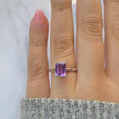  Buy Women Amethyst Gemstone Ring Online At The Best Price The amethyst ring is a flawless piece of adornments that grandstands the dazzling magnificence of the amethyst gemstone. Known for its staggering purple tint, the amethyst is an assortment of quartz that reaches in variety from light lavender to profound violet. This valuable gemstone has been exceptionally esteemed for a really long time and is venerated for its rich tone, splendor, and profound symbolism.The  amethyst ring  is a choice piece of adornments that features the enamoring excellence of the amethyst gemstone. Known for its dazzling purple shade, the amethyst is an assortment of quartz that reaches in variety from light lavender to profound violet. This valuable gemstone has been profoundly esteemed for quite a long time and is loved for its rich tone, splendor, and otherworldly imagery. 		 