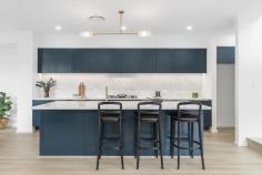 12 Moncrieff Dr East Ryde NSW 2113 $2,400,000 - $2,500,000 Defined by design that showcases quality and style, this expansive duplex has been thoughtfully imagined and impeccably crafted. The open concept living zone with seamless connection to the garden delights as an entertaining space, while the upstairs accommodation including magnificent owners' suite is a serene haven. Tucked on a quiet street, it's just steps to Wallumatta Nature Reserve and city buses, 400m to sought-after Ryde East Public School, with Macquarie Park and Top Ryde City shops minutes away. - Designed for a modern relaxed lifestyle with flowing living spaces - Bathed in light and connected to the outdoors by oversized windows - Luxurious kitchen complete with butlers' pantry and island seating - Primary bedroom boasts balcony, dressing room, ensuite with skylit bath - Three additional bedrooms upstairs with built-ins, extra lounge space - Flexible media room/home office or fifth bedroom on main level - Well zoned for guests with full bath on each level plus main ensuite - Stylish finishes include marble tiles, timber floors, brass tapware - Internal access to secure garage, ducted air conditioning throughout - In catchment for excellent schools, city bus departs near front door
