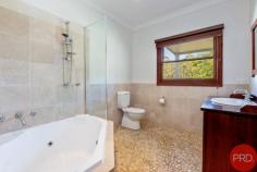 88 Quince Tree Lane Congewai NSW 2325 $1,950,000 - $2,145,000 Discover the epitome of the great Australian dream at 'Quince Cottage'. Perfectly situated on an expansive parcel of land, this beautiful home highlights a well-planned design that merges aesthetic elegance with practical functionality. Poised against the backdrop of Australia's stunning natural landscape, the home seamlessly integrates semi-rural allure with modern living on 104 acres. Located in one of the most breathtaking regions in the Hunter Valley, this captivating residence is situated only 15km from Cessnock CBD and 25km from the renowned wineries of Pokolbin and Lovedale. While being conveniently placed only a short drive from Congewai Primary School. The picturesque property combines approx 40 acres of arable flat land and fenced into 5 paddocks with 4 dams. This amazing property would suit horse enthusiasts or those just looking for a hobby farm in the beautiful Hunter Valley. The remainder is gently undulating hills filled with wildlife and natural bush - perfect for trail rides, bush walking or motor bikes. There is an extensive 5-bay colourbond machinery shed equipped with power, a sizable round yard, and another shed providing horse shelters, power, and floodlights, These horse shelters are solidly made and would also function as cattle yards or any livestock. If you enjoy country elegance, this is the home for you! A wide front verandah greets you as you walk up the stairs. You will be in awe of the high ceilings, decorative cornices, ambient lighting, and timber floorboards creating a relaxing atmosphere that transcends from room to room. The generously proportioned living spaces are augmented by ducted air conditioning and wood fireplace, the space is framed by breathtaking views of the lush green Australian countryside. An elegant kitchen takes centre stage and is tailored for culinary enthusiasts, with plenty of bench space and cupboard space, a corner pantry, a breakfast bar, and wine storage. A bi-fold window slides open to be a servery when entertaining on the stunning rear verandah, which overlooks the securely fence backyard and gives distant mountain views. Children and pets can safely play while you are at home or relaxing on the verandah. The family-friendly floorplan hosts well-appointed bedrooms with built-in robes, ceiling fans, and abundant natural light. The master suite beckons serenity, featuring a walk-in wardrobe, an ensuite, and French doors leading to a deck, offering a retreat amidst tranquil surroundings. A spacious barn-style garage boasts a loft, bathroom, kitchenette, and carport, which can be utilized as a teenage retreat or house your car collection with 6 parking bays. To complete your picture, a chook pen and fenced vegetable garden are close by.