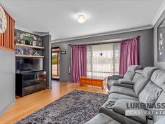 4 Strawberry Dr Seville Grove WA 6112 $400,000 The perfect family home or investment. Just look at this lovely 3 bedroom 1 bathroom plus 2 toilets home set in preferred Seville Grove location and set on a full sized 691 sqm block. The entry is via a full length shady verandah and the roomy floor plan offers a formal lounge (with bay window) and dining plus a family room inside the main home, while out back is a huge enclosed patio and adjoining open patio. Definitely a great space to entertain. Plenty of car cover too through the carport secured nicely behind the roller door. There is also a couple of options for workshop storage including a free standing shed plus excellent storerooms next to the carport. There is a bus stop right out front and main shopping, Bunnings and the Tonkin Highway are all very accessible. This home is neat and tidy and ready for you to move in.