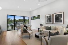 3 Dusk Street Kenmore QLD 4069 Contemporary, luxurious and superbly designed, this brand new home features stunning interiors with premium appointments, across two spacious levels. It's a stylish haven complete with private leisure facilities, for those who love to live comfortably and entertain in style. The thoughtfully planned layout also allows scope for dual living, to suit multi- generational families or to provide teenagers with their own space. Spanning an elevated easy-care block in a peaceful locale, you're within minutes of Kersley Road Shopping Village, Kenmore South State School and bus services to the city. Foyer with soaring ceiling, designer lighting, striking staircase Radiant open plan lounge/dining room with on-trend colour scheme and high ceilings throughout Flows onto northerly facing entertaining deck with district views Living area with drinks bar extends onto poolside patio and garden Kitchen has quality cabinetry, butlers' pantry and Argent tapware Bosch 900mm self-cleaning oven, induction cooktop with PerfectFry Generous bedrooms, versatile study to use as nursery or guestroom Main bedroom includes robes, ensuite with dual basins, Juliette balcony Sleek bathroom with freestanding bath, two separate powder rooms Custom timber cabinetry, stone finishes in kitchen and wet areas Ducted air conditioning, fans, beautiful breezes and natural light Double garage, professionally landscaped low maintenance grounds Walk to parks, few kilometres to cafés and supermarkets at Kenmore Set in the highly sought-after Kenmore State High School catchment Central to the Centenary Highway, Western Freeway, Legacy Way