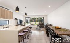 51 Wall Avenue Panania NSW 2213 $1,339,000 Appointed for a contemporary lifestyle, this executive residence has been intuitively designed with the finest of finishes with a growing family in mind. With easy access to local amenities, this beautiful duplex does not disappoint - Spacious living and dining with pet-friendly door leading out to the backyard - Quality kitchen includes gas cooking & large island stone bench with waterfall ends - 4 bright sunny double bedrooms + built-in robes - Large master bedroom + walk-in robe, ensuite and private balcony - Large skylight window upstairs, allowing a wealth of natural light - Ducted air-conditioning throughout & integrated 6.6kw solar panel system - Generous outdoor alfresco, perfect for weekend BBQ's with friends & family - Lock up garage with internal access - Sunny, secure backyard with room for the kids to run & play - Lovely wide street with minutes walk to Panania train station to city & airport - Close to local schools, parks, shops & transport Perfect location and great block of land, this generous size family home offers a cracking opportunity