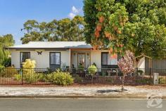 19 Mary St Kapunda SA 5373 $439,000 - $459,000 Nestled on a quaint corner block at 19 Mary Street in the charming town of Kapunda, this adorable residence embodies the perfect blend of comfort, character, and convenience. With its cute and quirky facade, this property boasts a plethora of delightful features that make it an ideal home for those seeking both charm and functionality. Upon entering this lovely abode, you are greeted by a newly renovated bathroom and kitchen area, exuding modern elegance and style. The seamless integration of contemporary fixtures and fittings with the home's original charm creates a unique and inviting atmosphere that is sure to captivate guests and residents alike. The kitchen, with its sleek countertops and ample storage space, provides the perfect setting for culinary adventures and family gatherings. The house offers three cozy bedrooms, each providing a peaceful sanctuary for rest and relaxation. Whether you're curling up with a good book or drifting off into a restful sleep, these bedrooms offer a tranquil retreat from the hustle and bustle of daily life. One of the highlights of this property is its gorgeous garden, which has been lovingly maintained and nurtured over the years. From the moment you step outside, you are greeted by an array of vibrant flowers, lush greenery, and fragrant fruit trees that create a serene oasis in the heart of the town. Additionally, tucked away at the side of the house, you'll discover a secret garden, providing a secluded spot for quiet contemplation or intimate gatherings with friends and family. For those who enjoy tinkering or pursuing DIY projects, a large shed with a workbench and shelving is included, offering plenty of space for storage and creative endeavors. Whether you're a seasoned craftsman or a weekend hobbyist, this versatile space is sure to inspire your next project. Conveniently located close to all amenities, including shops, schools, and public transportation, this property offers the perfect balance of tranquility and accessibility. Whether you're running errands or exploring the town's charming cafes and boutiques, everything you need is just a stone's throw away. In summary, 19 Mary Street is more than just a house; it's a place to call home. With its irresistible street appeal, lovely layout, and abundance of delightful features, this property offers a truly magical living experience. Don't miss your chance to make this enchanting residence your own.