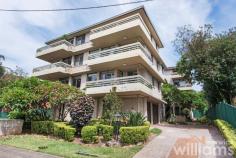 Unit 4/65 Parkview Rd Russell Lea NSW 2046 Framed by leafy gardens, this first floor apartment offers a peaceful and relaxed lifestyle in a parkside location. Set in a secluded position in a small secure complex opposite Russell Lea's Campbell Park, the oversized home delivers spacious interiors and the bonus of two private balconies. Enjoying natural airflow and an abundance of light, the low-maintenance layout features a large combined living and dining area, separate full-sized kitchen, and huge internal laundry. Recently refreshed with new carpet and paintwork, the move-in-ready home also has potential for further upgrades in the future. Conveniently located for nearby amenities, the property is only 300m to the waterfront, 260m to CBD bus routes, and 750m to Wareemba Village cafes and retail. • Two-bedroom apartment in boutique complex opposite Campbell Park • Spacious open-plan living and dining flowing to balcony with garden outlook • Modern electric kitchen featuring integrated oven, and dishwasher • Generously sized master bedroom with built-in robe and private balcony • Large guest bedroom includes mirrored built-in robe • Contemporary bathroom features shower, vanity, and plenty of storage • Huge internal laundry with space for separate dryer and washer • Freshly painted. New carpeting • Single space lock-up garage