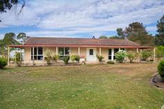 303 Haddon School Road Haddon VIC 3351 $699,000-$739,000 Nestled within a picturesque 5-acre landscape, this double brick home combines the charm of country living with modern comforts and convenience in the Haddon township, only 10 minutes from Ballarat's major shopping centre Delacombe Shopping Centre (DTC). • The home features three bedrooms, two equipped with built-in robes, while the expansive master bedroom boasts a walk-in robe and soft underfoot carpet. Outside the home also features a bungalow with cooling. • The recently updated bathroom includes a contemporary shower, spa bath, and sleek vanity with excellent white tiles throughout. • The kitchen is the beating heart of the home, featuring hardwood timber flooring, ample bench space with complimentary island, electric oven and cooktop. This well landscaped kitchen overlooks gardens and the dining area for functionality and convenience. • The living area has large windows allowing plenty of natural light and wide views of the front yard so you can keep an eye on the kids outside. • Be comfortable year-round with the split system and lovely wood fire further amplifying the country experience. • With large double bay carport and a substantial 18m x 7m shed with additional workshop area power and concrete. Perfect for any car enthusiast or handyman. • Outside the home surrounded by a veranda and features fenced paddocks, dams and landscaped gardens. Main services include septic, electricity, water and a solar system to keep the bills down. • Location- 15 minutes from the Centre of Ballarat, 80 minutes to Geelong and 90 minutes to Melbourne. This property is an exceptional find for those seeking the peace of country living without sacrificing the conveniences of close by amenities. Whether your family is looking for room to grow, a hobbyist needing ample space for projects, or someone seeking a tranquil retreat, this home caters to all.