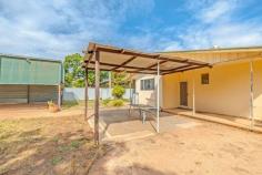 235 Commercial Street Merbein VIC 3505 $299,000 - $328,000 Quietly tucked away within a corner of Merbein is this neat and tidy family home on a generous 1026m2 allotment (approx.) Comprising of 3 bedrooms all with built in robes, a spacious family bathroom complete with bath and stand over shower, separate toilet and laundry. Practical living is provided in the home, starting at the functional layout of the kitchen which offers gas cooking, ample cupboard space for storage and an abundance of natural sunlight all set overlooking the dining are following on to the lounge area. Outside has the space to do as you please with a secure backyard, undercover outdoor entertaining area, large garden shed to lock your belongings away and a 3 car undercover bay - all fitted with garage doors and can be accessed via Comb Street. Additional features include; wood fire heating, split system heating and cooling as well as evaporative cooling for year round comfort. Located only minutes from Merbein P10 College, shops and amenities and a current rental appraisal of $350 per week, be sure to inspect for yourself.