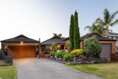 6 Scotsburn Court Mornington VIC 3931 $1,385,000 - $1,450,000 An evocative entertainer ready to meet the needs of growing families, this five-bedroom 3-lounge home grants a relaxed living experience across an interior rich in space and seclusion. Spread across an easy-care allotment of 1001sqm (approx.), a distinct entertaining-focus filters from front to back, crafting a foundation for true family fun. Immediately introduced to large-scale proportions, the home's three separate living zones open to the heart where a dining space and well-appointed kitchen holds attention with luxury stone benchtops, premium double-door cooker and expansive island bench. Matching indoor cooking facilities with a fully-fitted custom outdoor kitchen, a new benchmark in alfresco enjoyment presents alongside a sun-drenched deck, wood fired pizza oven, above-ground spa and easy-care garden. A collection of four junior bedrooms are introduced by a grand master suite where a dressing room and light-filled ensuite set a superior standard. Finished with premium craftsmanship and a commitment to quality inclusions, this grand family home comes complete with polished timber floors, split-system air conditioning, a separate studio with exterior access and a double garage amongst landscaped front gardens. Delivering a lifestyle of true family appeal, only moments from Bentons Junior College, Bentons Square, Mornington Main Street, local parklands and easy freeway access.