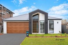 12 PLANTHOPPER Street Marsden Park NSW 2765 Architecturally Designed this spacious single-storey home is an entertainer's dream on 344 sqm. sitting on a high side of the street designed with sleek contemporary aesthetics which is ultra-modern in concept and warmly inviting. * Spacious wide entry foyer via large doors. * Massive Luxury light filled open plan dining & living zone. * Additional living space with gas fireplace * Sleek & stylish kitchen features large island bench with 60mm Caesarstone tops and waterfall edging, quality stainless steel appliances, gas cooking, dishwasher and built-in microwave oven. * Generous study / home office * Huge master suite comprises of large walk-in robe and palatial ensuite with freestanding bathtub and double vanity * Modern family bathroom with freestanding bathtub with toilet * Automatic double lock up garage with internal access. * 5 indulgent bedrooms with walk-in robes, two ensuites * 2 Master Bedroom with ultra modern bathroom with stone-top vanity, bath and shower. * multi-zone ducted air-conditioning ensure this home sets a benchmark for comfort, style and conscience. * Open plan Family area *Luxury Down-lights throughout the home * Huge, secure back yard, fully landscaped with uplighting * outdoor gas cooking with Alfresco area Short Drive to Business Park - Costco, Ikea, Bunnings Walking Distance to Lake & playing fields Short distance to St Luke's Catholic School