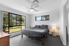 2 Serene Way Wondunna QLD 4655 $625,000 This lovely welcoming home is located in the quiet Neighbourhood Park Estate which is just minutes to Stockland's Shopping Centre, Hospital and the CBD. The home is ideal for a growing family, investor or a couple looking to downsize with a caravan. • Four bedroom lowset home • Ensuite/walk-in robe on the primary bedroom • Separate family & lounge rooms • Pristine kitchen has stone bench-top, gas stove top & dishwasher • Covered alfresco entertaining area located off family room • Ducted zoned air-conditioning, ceiling fans in all bedrooms • Main bathroom has a shower & bath, separate toilet • Double tilt panel remote garage with internal access & laundry included • 644 sqm fully fenced allotment with great side access for a large caravan or boat • Security screens and doors through-out • Outstanding tenants in place at $570 per week (lease expires 11/07/2024)