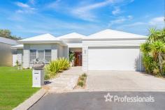 2 Estuary View Drive Geographe WA 6280 $1,450,000 This home is magnificently presented and cared for. A delight to present to the astute buyer that wants a special home positioned in a lovely quiet cul-de-sac close to the beach, Port Geographe Marina, and iconic wetlands with birdlife. Entertain in style with a delightful alfresco area complete with a timber lined ceiling and aggregate flooring, boasting a barbeque area with natural gas point for the BBQ and sink/ benches for preparation. The cleaver design seamlessly integrates the outdoor entertainer with the theatre media room so the cook can still enjoy watching sports games. This exquisite one off design, well built by Perth award winning builders comprises of an Inviting central open plan living design with an enclosed large feature wood fire and adjoining theatre room able to be closed off too. The large functional dream kitchen is a MUST HAVE for the cooks, offers ample counter space, a walk in pantry and a multitude of cupboards More features include; • Natural gas 5 burner hot plate • Under bench wide electric oven • Stainless steel dishwasher • Neutral soft close draws • Double fridge recess • Plumbed fridge/freezer • Microwave recess. Four good sized bedrooms each with robes • Master bedroom with dream ensuite complete with dual vanities, plenty of storage space, deep bath and walk in hobless shower. • Functional large laundry makes this area with ease to work. • Instantaneous natural gas Renni hot water system. • Overlooking easy care reticulated lawns and garden to Busselton Mains. Aggerate drive and path way City of Busselton is the GATE WAY to the tourist area of the famous Margaret River wine region. We have everything at your doorstep including multitude of wineries, cafes, restaurants and amazing fishing, surfing, hiking and bike trails and only a short drive to the iconic Busselton Jetty and newly established Busselton Airport with direct flights to Melbourne and Sydney. Access to a variety of sporting activities and clubs, and schools state, high, TAFE college and unis both state and private available.