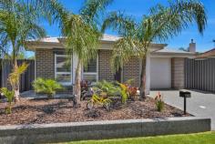 9A Ayling Street Willaston SA 5118 There's no doubt the immaculate street presence of this contemporary home and its tropical-style front garden will pique your interest - and the great news is the best is yet to come. Matt Bunder welcomes you to 9A Ayling Street, Willaston. Built in 2018 and with as-new presentation, this home is ideal for empty nesters, downsizers or smaller families all wanting a property with style. Inside, the floating floors, plantation shutters and plush dark carpet in the three bedrooms will all entice you to relax, the master has a walk-in-robe, ensuite with on trend black tapware, and a split system air conditioner along with a fan light. The other two bedrooms both have built-in-robes and the family bathroom complements the ensuite style, while even the laundry has the same black tapware. But it's the indoor/outdoor living and dining spaces and the tranquil yard with inground pool which will really capture your imagination. Sporting a recent interior wall repaint, the property presents beautifully, while the trio of dark pendant lights above the front kitchen bench and the black sink continue the contemporary feel. There's a gas cooktop, a Chef oven and a Dishlex dishwasher while the galley style kitchen opens to a walk-in pantry at one end. Enjoy family meals either in your dining zone or open the sliding door to your alfresco, with timber decking and zip track café blinds inviting you outside. The view out here is lovely too, with the yard looking much larger than it is, thanks to considered tropical style plantings, like palms, Strelitzia and lush Philodendron and the sparkling deep blue inground pool, which enjoys solar heating. Summer swims are definitely calling. The tranquil view continues with a small freestanding pool pavilion beyond, grab your latest read, sunglasses and enjoy this space in between dips. This is the life. When you need to stock up on sausages for the barbecue and lime for the cocktails, you'll be pleased that the home is about 1.5kms from the main street of Gawler. Xavier College is under 3kms away and access to the Sturt Highway is approximately 1km away for commuters. This is the sort of home where you'll still be proud to entertain your family and friends, without the work of a larger property. And when they've gone home, you may still have some free time to enjoy the property yourself! Specifications: Land Size: 399msq (approx) Council : Gawler Zoning : R - Residential\11 - Willaston Residential\ Built: 2018