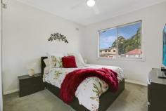 22 Lakelands Drive Dapto NSW 2530 $750,000 - $790,000 Welcome to this exquisite 4-bedroom home, where modern elegance meets timeless charm. Step inside to discover high ceilings adorned with ornate cornices, adding a touch of grandeur to every room. The recently modernized interior boasts a brand new kitchen featuring 40mm benchtops, a sleek glass splashback, and the convenience of a dishwasher. The modern bathroom, complete with a second toilet in the laundry, offers both style and functionality. Entertain guests effortlessly on the expansive covered entertainment area, perfect for alfresco dining or relaxing in the fresh air. Situated on a level 658m2 block, this property includes a convenient drive-through garage and additional storage sheds for all your storage needs. Enjoy the proximity to parks, playing fields, and easy freeway access, making this home the epitome of comfort, style, and convenience. HIGHLIGHTS • 4 bedrooms • Modern kitchen with glass splashback and dishwasher • High ceilings with ornate cornices • Modernised bathroom with second toilet in laundry • Covered entertainment area • Drive through garage and sheds • Level 658m2 block • Close to parks and playing fields • Close to freeway access