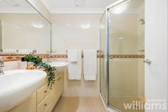 Unit 2/1 Kings Bay Ave Five Dock NSW 2046 Peaceful and private, this spacious garden apartment offers a flexible and generous layout that will excite both downsizers and growing families. Located in the renowned Kings Bay Estate, the three-bedroom home enjoys a ground floor position in a low-rise building overlooking Barnwell Park Golf Club. Recently refreshed with new paintwork, the well-presented interiors include a large master bedroom with ensuite, modern gas kitchen, and internal laundry with dryer. Flowing from the open-plan living space is a delightful garden and dining terrace, framed by established trees and flowering plants. The complex includes onsite amenities such as a large outdoor swimming pool and children's playground. Plus, convenient access to nearby amenities, including Five Dock retail, CBD transport, and the Canada Bay Club - all situated within 700m. • Tranquil three-bedroom apartment in the Kings Bay security complex • Large master bedroom featuring built in robe and ensuite • Two spacious guest bedrooms, both with mirrored built-in robes • Modern kitchen featuring high quality European appliances, and stone benchtops • Large guest bathroom including spa bath and separate shower • Expansive open-plan living and dining space with flow to private garden • Undercover alfresco dining terrace framed by established trees and plants • Internal laundry including dryer. Storage. Air con. Plantation shutters throughout • Double lock-up garage